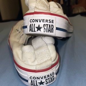 White Converse slip ons